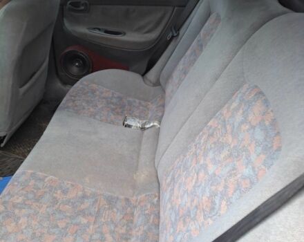 Красный Дэу Нубира, объемом двигателя 2 л и пробегом 137 тыс. км за 1537 $, фото 4 на Automoto.ua