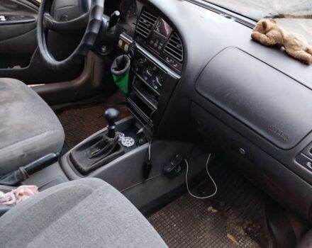 Красный Дэу Нубира, объемом двигателя 0 л и пробегом 200 тыс. км за 800 $, фото 1 на Automoto.ua