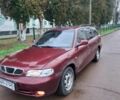 Красный Дэу Нубира, объемом двигателя 2 л и пробегом 137 тыс. км за 1537 $, фото 1 на Automoto.ua