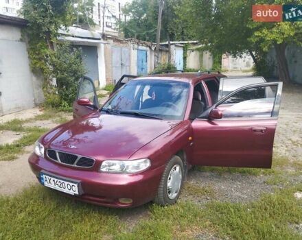 Червоний Деу Нубіра, об'ємом двигуна 1.6 л та пробігом 226 тис. км за 2600 $, фото 14 на Automoto.ua