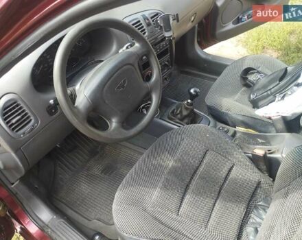 Червоний Деу Нубіра, об'ємом двигуна 1.6 л та пробігом 226 тис. км за 2600 $, фото 6 на Automoto.ua