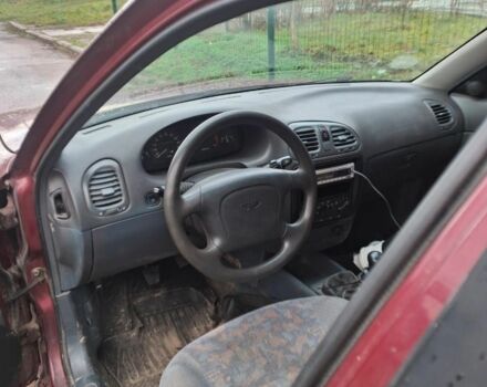 Красный Дэу Нубира, объемом двигателя 2 л и пробегом 137 тыс. км за 1537 $, фото 3 на Automoto.ua