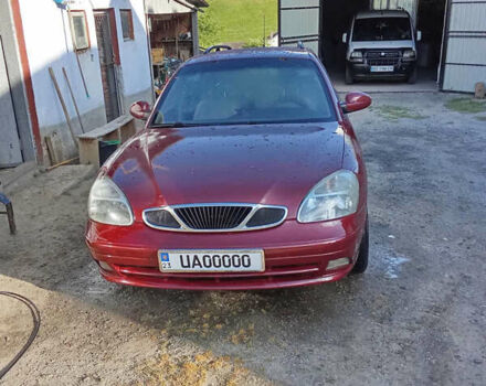 Красный Дэу Нубира, объемом двигателя 1.6 л и пробегом 340 тыс. км за 2650 $, фото 2 на Automoto.ua