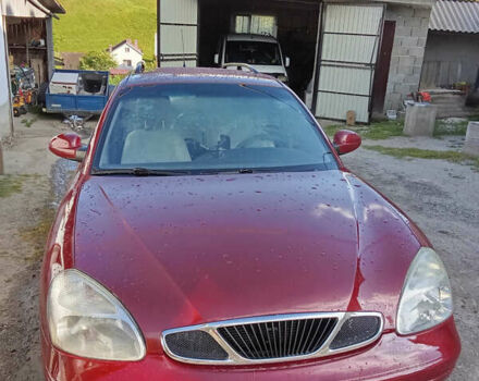 Красный Дэу Нубира, объемом двигателя 1.6 л и пробегом 340 тыс. км за 2650 $, фото 12 на Automoto.ua