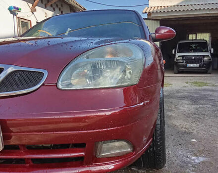 Красный Дэу Нубира, объемом двигателя 1.6 л и пробегом 340 тыс. км за 2650 $, фото 10 на Automoto.ua