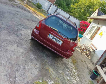 Красный Дэу Нубира, объемом двигателя 1.6 л и пробегом 340 тыс. км за 2800 $, фото 4 на Automoto.ua