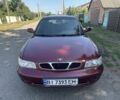 Красный Дэу Нубира, объемом двигателя 1.6 л и пробегом 212 тыс. км за 1650 $, фото 1 на Automoto.ua