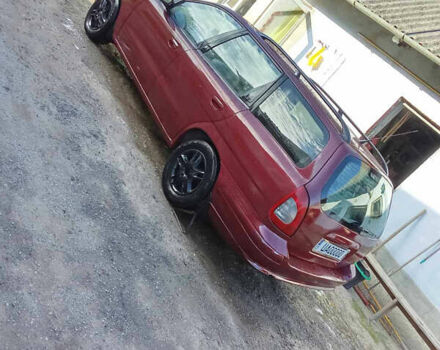 Красный Дэу Нубира, объемом двигателя 1.6 л и пробегом 340 тыс. км за 2800 $, фото 3 на Automoto.ua