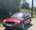 Красный Дэу Нубира, объемом двигателя 2 л и пробегом 370 тыс. км за 2200 $, фото 1 на Automoto.ua