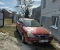 Красный Дэу Нубира, объемом двигателя 1.6 л и пробегом 428 тыс. км за 1600 $, фото 1 на Automoto.ua