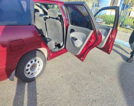 Красный Дэу Нубира, объемом двигателя 1.6 л и пробегом 110 тыс. км за 2900 $, фото 4 на Automoto.ua