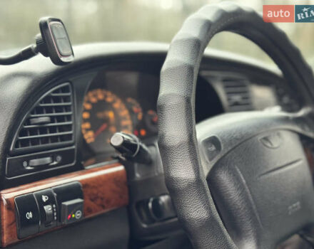 Красный Дэу Нубира, объемом двигателя 2 л и пробегом 299 тыс. км за 1299 $, фото 16 на Automoto.ua