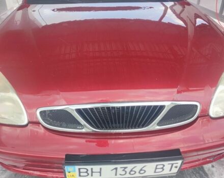 Красный Дэу Нубира, объемом двигателя 1.6 л и пробегом 110 тыс. км за 2900 $, фото 5 на Automoto.ua