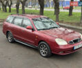 Красный Дэу Нубира, объемом двигателя 2 л и пробегом 299 тыс. км за 1299 $, фото 1 на Automoto.ua