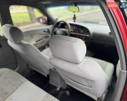 Красный Дэу Нубира, объемом двигателя 2 л и пробегом 299 тыс. км за 1299 $, фото 5 на Automoto.ua
