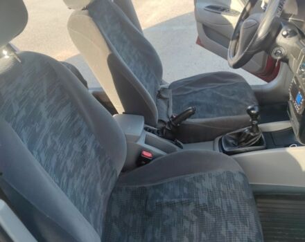 Красный Дэу Нубира, объемом двигателя 1.6 л и пробегом 110 тыс. км за 2900 $, фото 2 на Automoto.ua