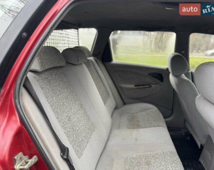 Красный Дэу Нубира, объемом двигателя 2 л и пробегом 299 тыс. км за 1299 $, фото 13 на Automoto.ua