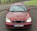 Красный Дэу Нубира, объемом двигателя 2 л и пробегом 270 тыс. км за 1299 $, фото 1 на Automoto.ua
