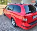 Червоний Деу Нубіра, об'ємом двигуна 1.8 л та пробігом 237 тис. км за 3850 $, фото 11 на Automoto.ua