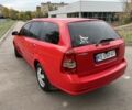 Красный Дэу Нубира, объемом двигателя 1.6 л и пробегом 207 тыс. км за 3050 $, фото 2 на Automoto.ua