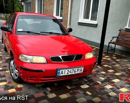 Червоний Деу Нубіра, об'ємом двигуна 1.6 л та пробігом 250 тис. км за 1299 $, фото 1 на Automoto.ua