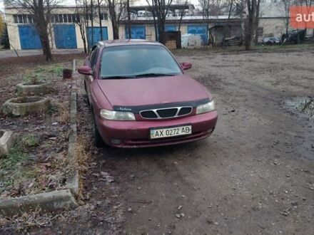 Красный Дэу Нубира, объемом двигателя 1.6 л и пробегом 300 тыс. км за 1200 $, фото 1 на Automoto.ua