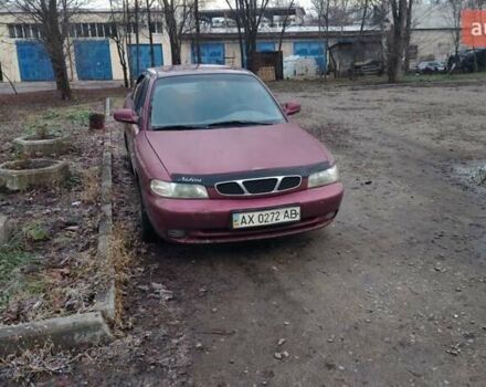 Красный Дэу Нубира, объемом двигателя 1.6 л и пробегом 300 тыс. км за 1200 $, фото 1 на Automoto.ua