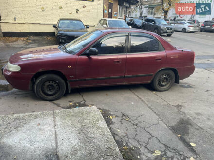Красный Дэу Нубира, объемом двигателя 1.6 л и пробегом 100 тыс. км за 1500 $, фото 1 на Automoto.ua