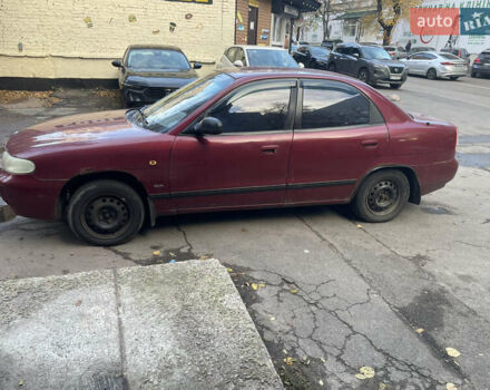 Деу Нубіра 1998 у Києві на Automoto.ua Червоний Деу Нубіра, об'ємом двигуна 1.6 л та пробігом 100 тис. км за 1500 $, фото 1 на Automoto.ua