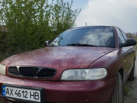 Красный Дэу Нубира, объемом двигателя 2 л и пробегом 200 тыс. км за 1100 $, фото 1 на Automoto.ua
