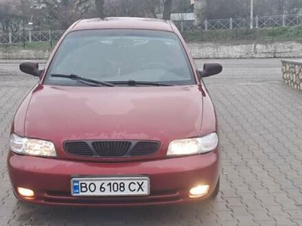 Красный Дэу Нубира, объемом двигателя 1.6 л и пробегом 200 тыс. км за 2655 $, фото 1 на Automoto.ua