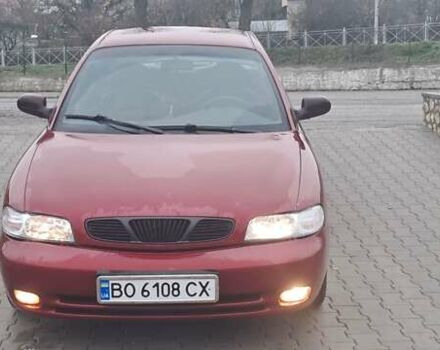 Красный Дэу Нубира, объемом двигателя 1.6 л и пробегом 200 тыс. км за 2655 $, фото 1 на Automoto.ua