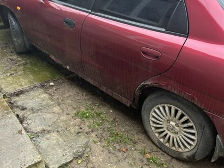 Красный Дэу Нубира, объемом двигателя 1.6 л и пробегом 230 тыс. км за 1400 $, фото 1 на Automoto.ua