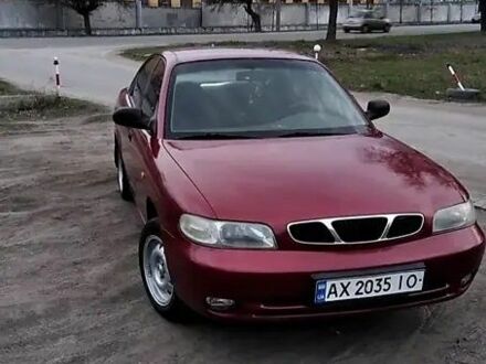 Деу Нубіра 1998 у Новомосковске на Automoto.ua Червоний Деу Нубіра, об'ємом двигуна 1.6 л та пробігом 160 тис. км за 1900 $, фото 1 на Automoto.ua