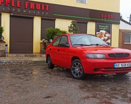 Деу Нубіра 1998 у Люботине на Automoto.ua Червоний Деу Нубіра, об'ємом двигуна 1.6 л та пробігом 225 тис. км за 1800 $, фото 1 на Automoto.ua