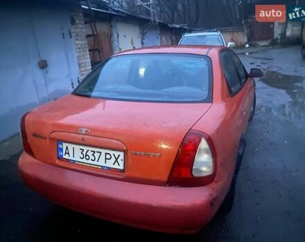 Красный Дэу Нубира, объемом двигателя 1.6 л и пробегом 270 тыс. км за 900 $, фото 1 на Automoto.ua