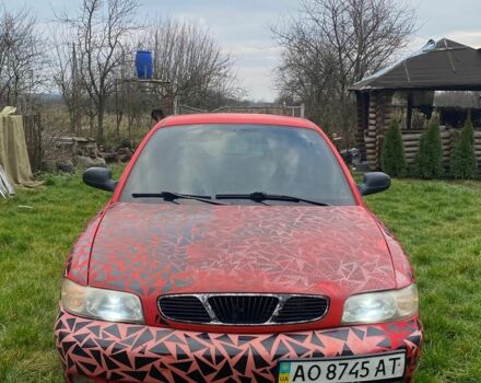 Красный Дэу Нубира, объемом двигателя 1.6 л и пробегом 180 тыс. км за 1050 $, фото 1 на Automoto.ua