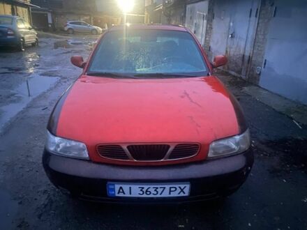 Красный Дэу Нубира, объемом двигателя 1.6 л и пробегом 270 тыс. км за 1100 $, фото 1 на Automoto.ua