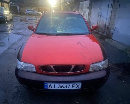 Красный Дэу Нубира, объемом двигателя 1.6 л и пробегом 270 тыс. км за 1100 $, фото 1 на Automoto.ua