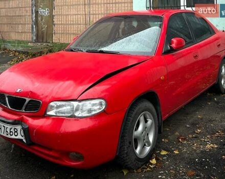 Красный Дэу Нубира, объемом двигателя 1.6 л и пробегом 230 тыс. км за 1100 $, фото 1 на Automoto.ua