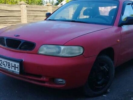 Красный Дэу Нубира, объемом двигателя 1.6 л и пробегом 346 тыс. км за 1500 $, фото 1 на Automoto.ua