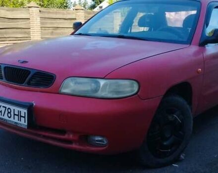 Красный Дэу Нубира, объемом двигателя 1.6 л и пробегом 346 тыс. км за 1500 $, фото 1 на Automoto.ua