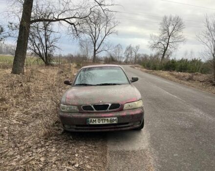 Красный Дэу Нубира, объемом двигателя 1.6 л и пробегом 347 тыс. км за 339 $, фото 1 на Automoto.ua