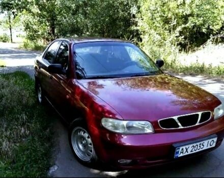 Красный Дэу Нубира, объемом двигателя 1.6 л и пробегом 160 тыс. км за 2000 $, фото 1 на Automoto.ua