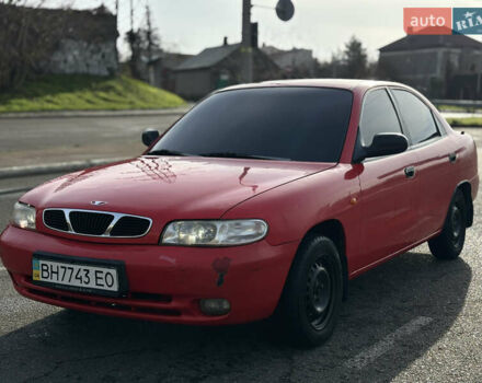 Красный Дэу Нубира, объемом двигателя 1.6 л и пробегом 180 тыс. км за 1750 $, фото 1 на Automoto.ua