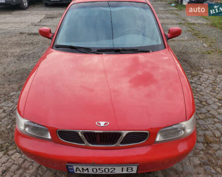 Красный Дэу Нубира, объемом двигателя 1.6 л и пробегом 300 тыс. км за 1400 $, фото 1 на Automoto.ua