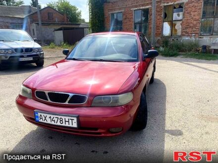 Деу Нубіра 1998 у Змиеве на Automoto.ua Червоний Деу Нубіра, об'ємом двигуна 1.6 л та пробігом 229 тис. км за 1800 $, фото 1 на Automoto.ua