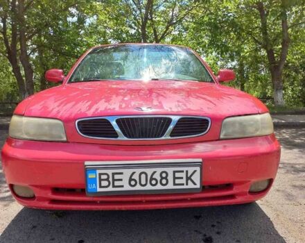 Червоний Деу Нубіра, об'ємом двигуна 1.6 л та пробігом 313 тис. км за 1200 $, фото 1 на Automoto.ua