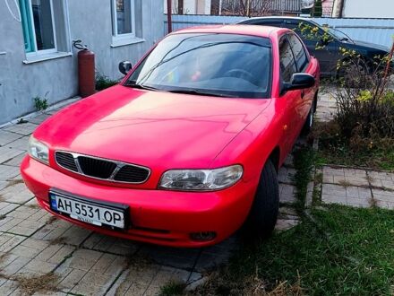 Красный Дэу Нубира, объемом двигателя 1.6 л и пробегом 183 тыс. км за 2500 $, фото 1 на Automoto.ua