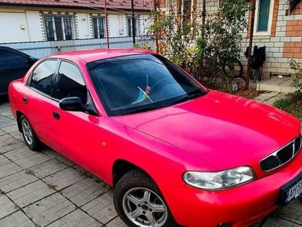 Красный Дэу Нубира, объемом двигателя 1.6 л и пробегом 183 тыс. км за 2500 $, фото 1 на Automoto.ua